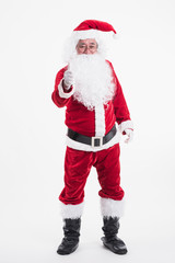 Portrait of a happy Santa cross showing thumb up on a white background, Winter holiday, Merry Christmas and happy new year concept