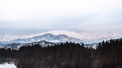 Fototapeta na wymiar Wide landscape of mountain range in Fukushima, Tohoku, Japan in Winter time landscape