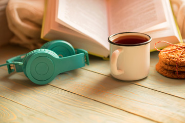 Winter holidays concept. Bookreading and music