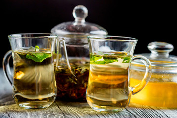 Herbal tea with honey and mint leaves