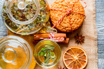 Herbal Christmas tea with honey and mint leaves
