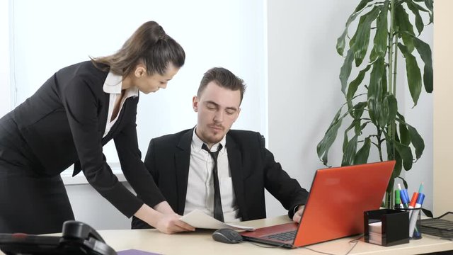 Sexual Harassment In The Office, The Boss Flirting With The Secretary, The Girl Brought A Report To Her Boss 60 Fps