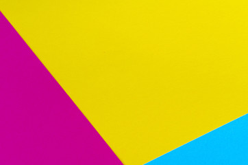 Colored geometric paper texture background.