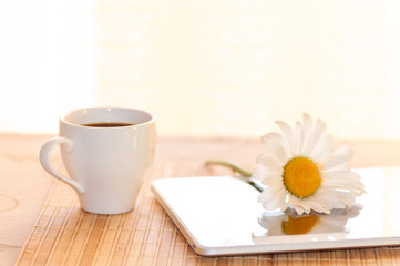 morning coffee and chamomile on the tablet, filter applied