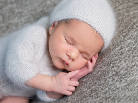 Portrait of newborn baby boy sleeping