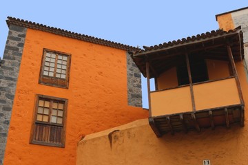 Typical windows and balcony on traditional residential homes on Canary Island 