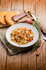 butterfly pasta with speck mozzarella and pumpkin