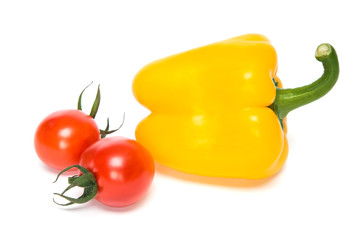 Red tomatoes and paprika pepper isolate on white background