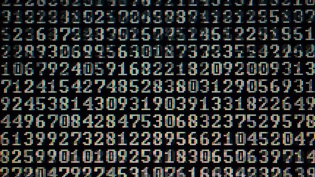 Binary code on the monitor screen.