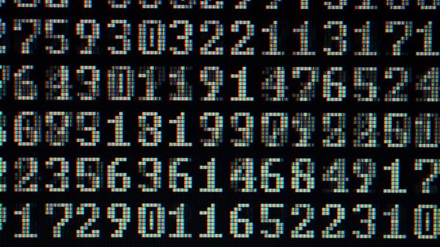 Binary code on the monitor screen.
