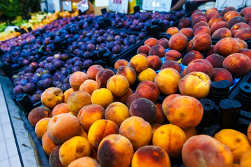 Shop bazaar fruits and vegetables. Set of plum fruits, peaches, grapes