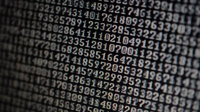 Binary code on the monitor screen.