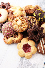 tasty fresh Christmas cookies on  white wooden table
