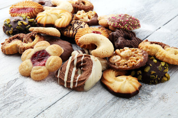 tasty fresh Christmas cookies on  white wooden table