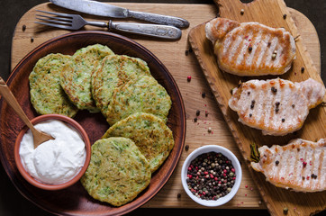 Pork chops with peppers and zucchini pancakes