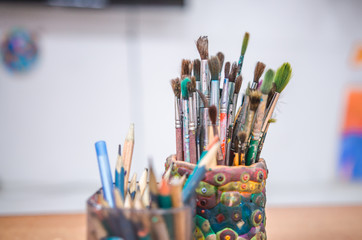 Set of artistic brushes in basket