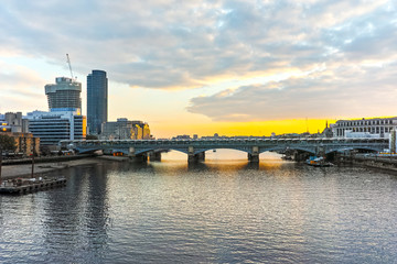 Fototapeta na wymiar Amazing sunset Cityscape from Millennium Bridge and Thames River, London, Great Britain