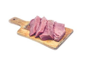 Raw beef stakes on a chopping board. The isolated object on a white background