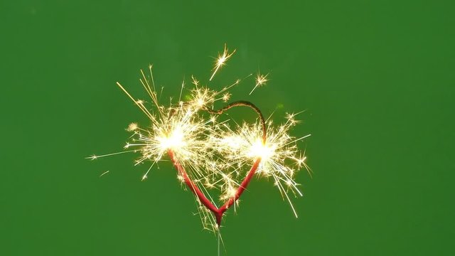 sparkling burning heart, green screen, sparkler