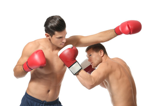 Attractive young boxers fighting on white background