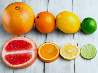 Citrus fruits lemon , grapefruit. lime and orange arranged in 