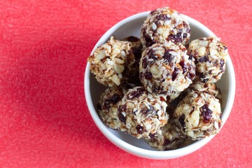 Handmade vegan balls made from coconut, cranberries and nuts.