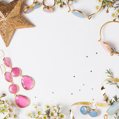 Flat lay with pink and blue necklace (square)