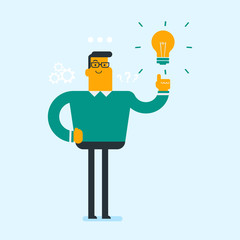 Excited caucasian white businessman pointing finger up at bright idea light bulb