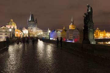 Obraz premium Night snowy Prague Old Town from Charles Bridge, Czech republic