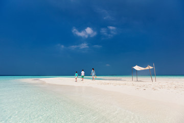 Mother and kids at tropical beach