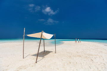 Mother and kids at tropical beach