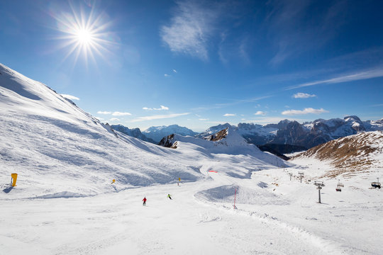 Beautiful ski slope connects Ciampac and Buffaure ski resorts, Val di Fassa valley, Dolomites, Italy