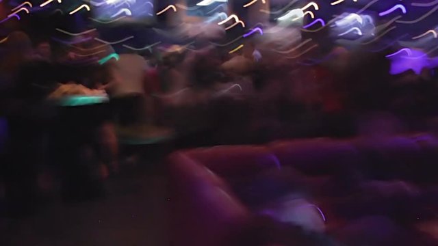 POV of drug addict person trying to walk away from night club, timelapse video