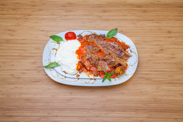 Kebap meat with sauce and yoghurt
