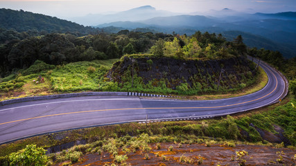 Beautiful mountain and road landscape with sunrise located Doi Inthanon, Chiang Mai, Thailand