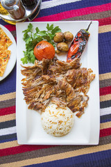 Turkish kebap meat with pilav rice and sides