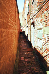 Really narrow alley in the city of Victoria, British Columbia, Canada. Its red bricks make it look really vintage and charming