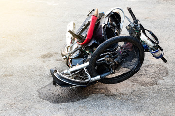 Motorcycles demolished until distorted wheels.