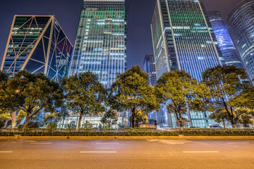 Empty asphalt road through modern city in Shanghai, China.