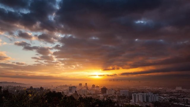 Beautiful sunrise over Los Angeles cityscape. 4K UHD Timelapse.