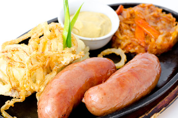 two grilled frankfurters