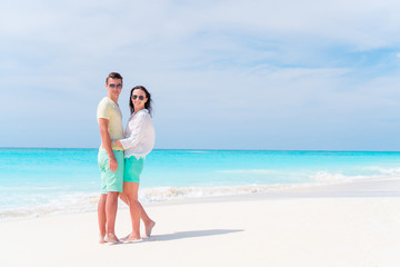 Happy family of two enjoy beach vacation
