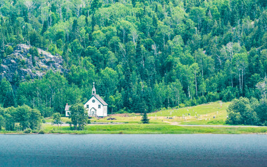 Iconic small church embedded in the mountains in Northern Ontario in the summer