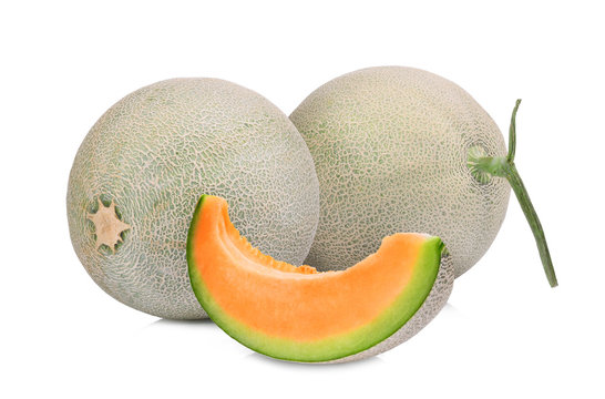 two whole and slice of japanese melons, orange melon or cantaloupe melon with seeds isolated on white background