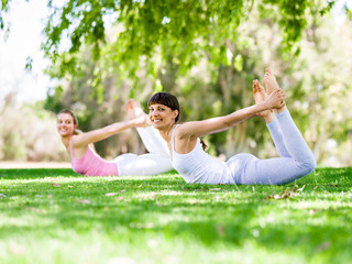 Young women exercising in the park