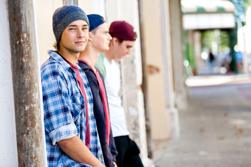 Fototapeta premium Teenage friends standing at the street