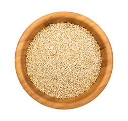 Quinoa in a wooden bowl isolated