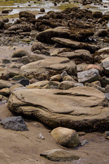 huge rocks lining around the river bank