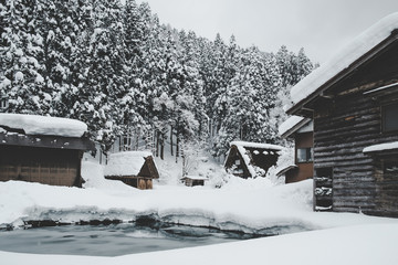 Historic Villages of Shirakawa-go, Japan in snowy day, film tone, classic look.
