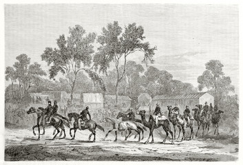 Ancient explorers take a expedition on horses and dromedaries in the jungle, starting from a small village. Burke and Wills expedition from Melbourne. By Grimaud published on Le Tour du Monde 1862